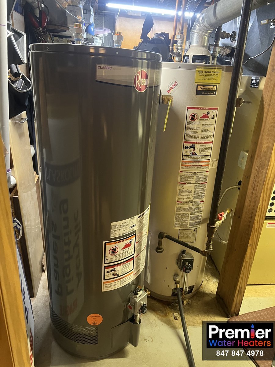 New Rheem Professional Classic next to old Kenmore Power Miser 9 50-gallon water heater Buffalo Grove IL