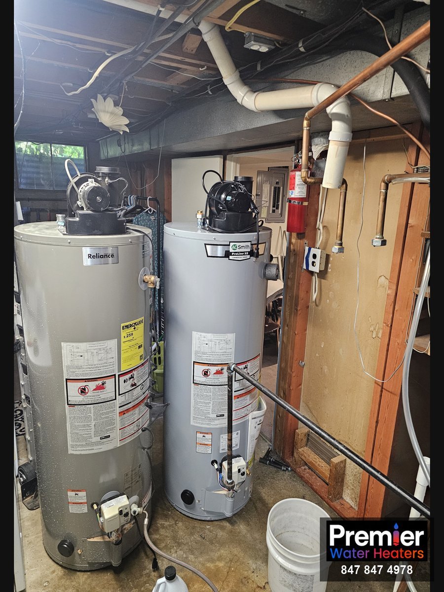 Old Reliance and new AO Smith power vent water heaters side by side Crystal Lake IL