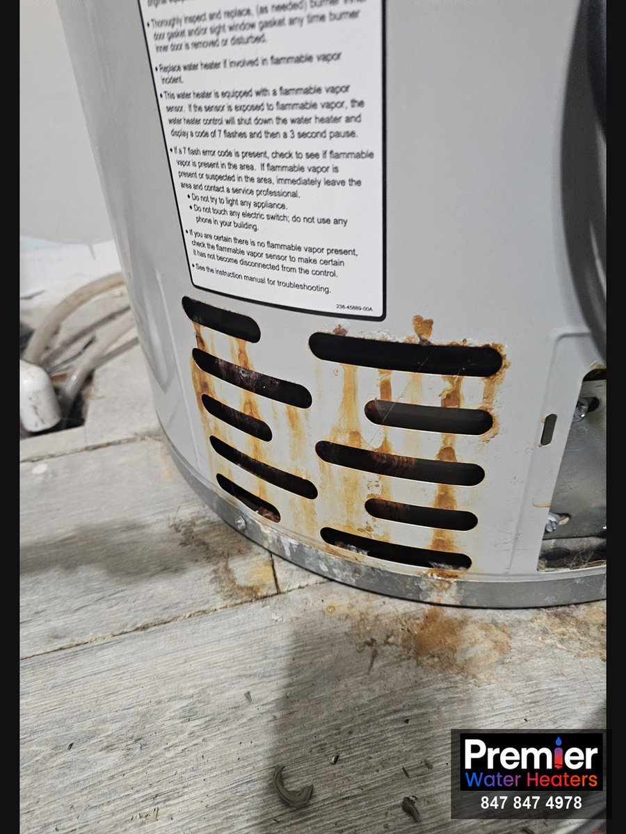 Corroded burner area on failed water heater before replacement Fox River Grove IL