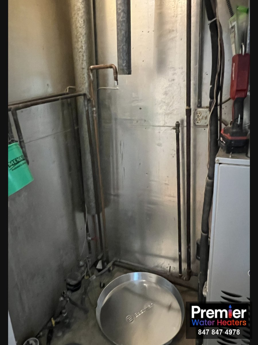 Water heater closet cleared and prepped with new drain pan Hoffman Estates IL