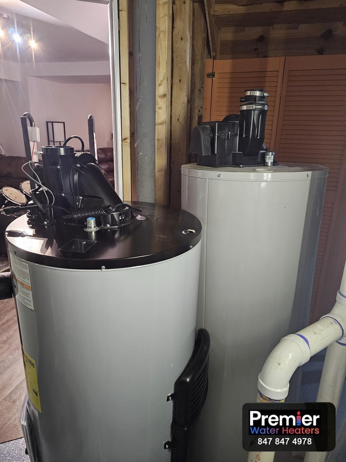 Old Bradford White and new AO Smith power vent water heaters side by side Algonquin IL