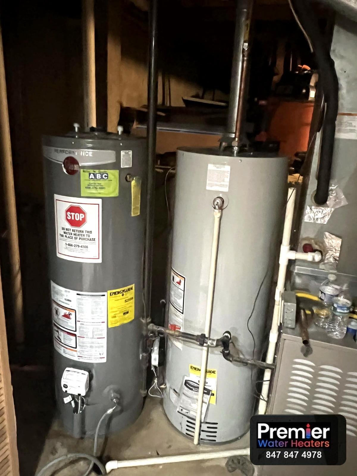 Old Rheem and new Bradford White 40 gallon water heaters during replacement Cary IL
