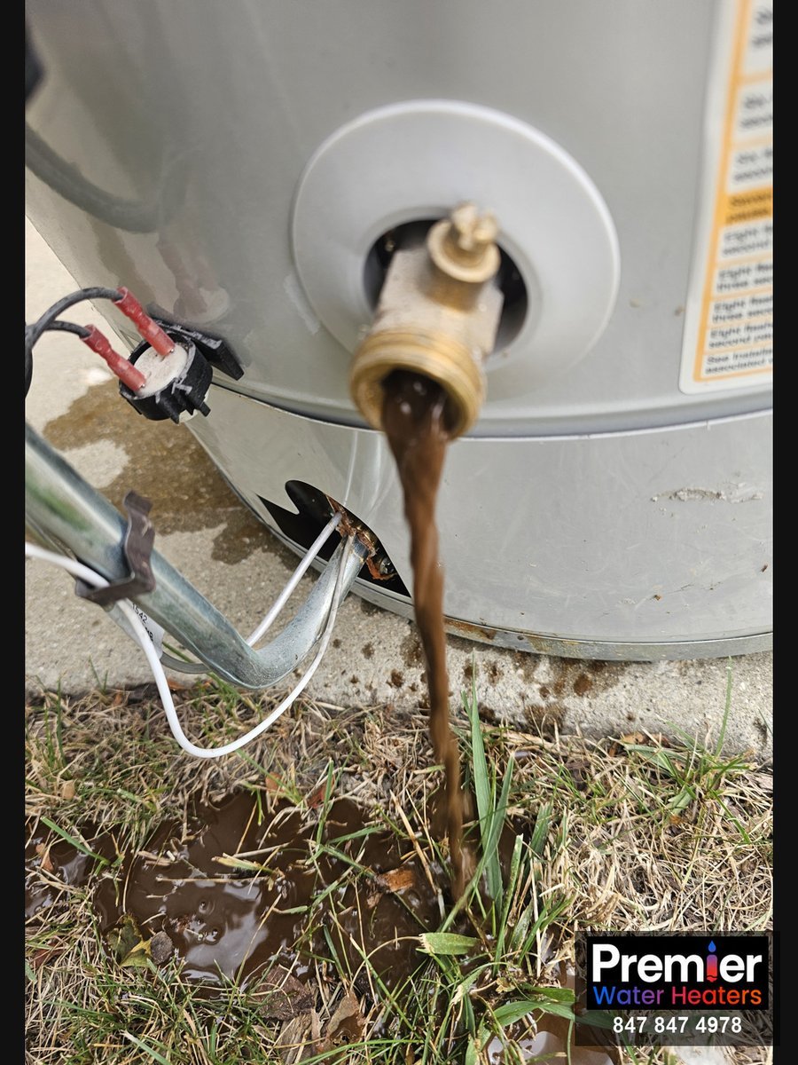 Failed water heater draining rusty sediment during removal Palatine IL