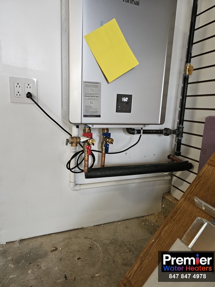 Rinnai 199K BTU tankless water heater installed in garage Schaumburg IL Premier Water Heaters